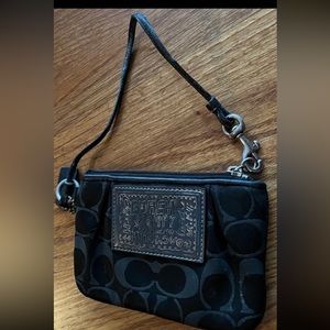 Coach poppy black and silver wristlet